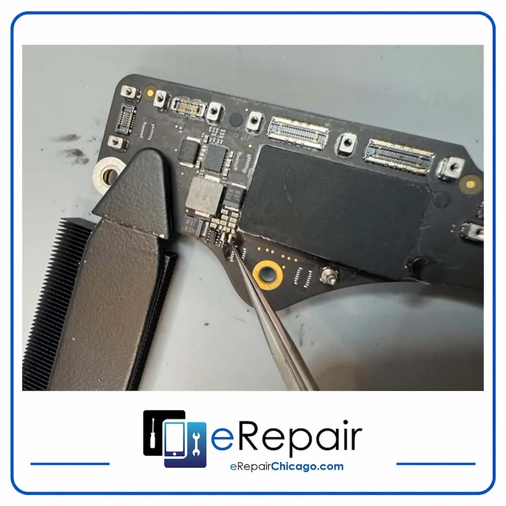 MacBook charging IC component replacement during board-level repair