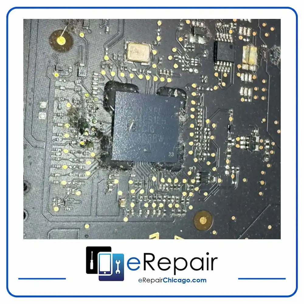 MacBook Pro logic board with traced and rebuilt connections after liquid damage repair